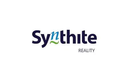 Synthite Realty logo with blue and green typography.